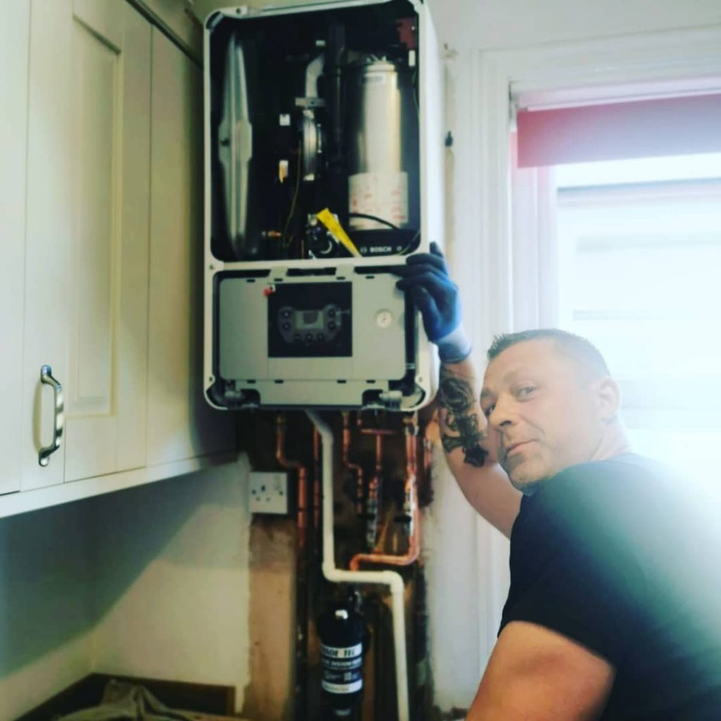 Anthony Cachia owner of DPH pictured with a newly installed boiler.